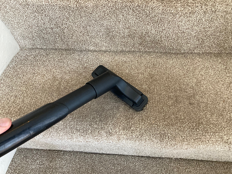 Harry vacuum's upholstery brush for stair cleaning