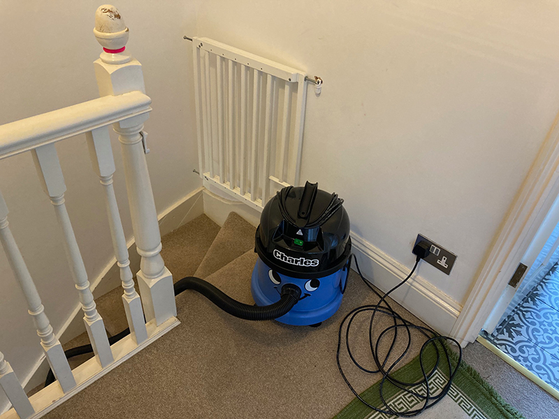 Stair cleaning with Charles vacuum