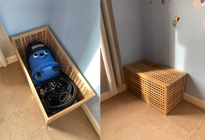 A Charles vacuum being stored in a storage chest