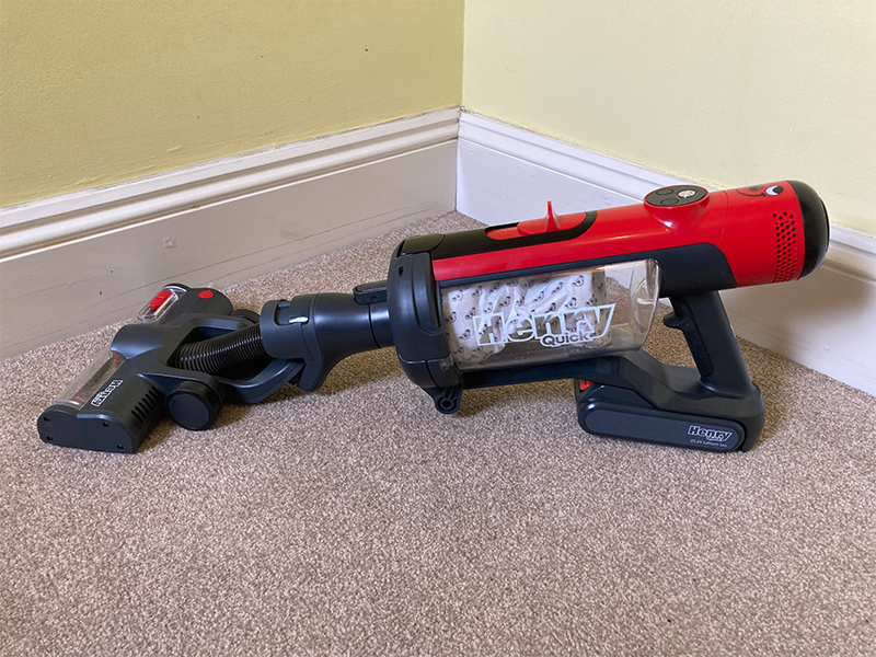 A Henry Quick vacuum cleaner in handheld mode with the motorised floor head attached