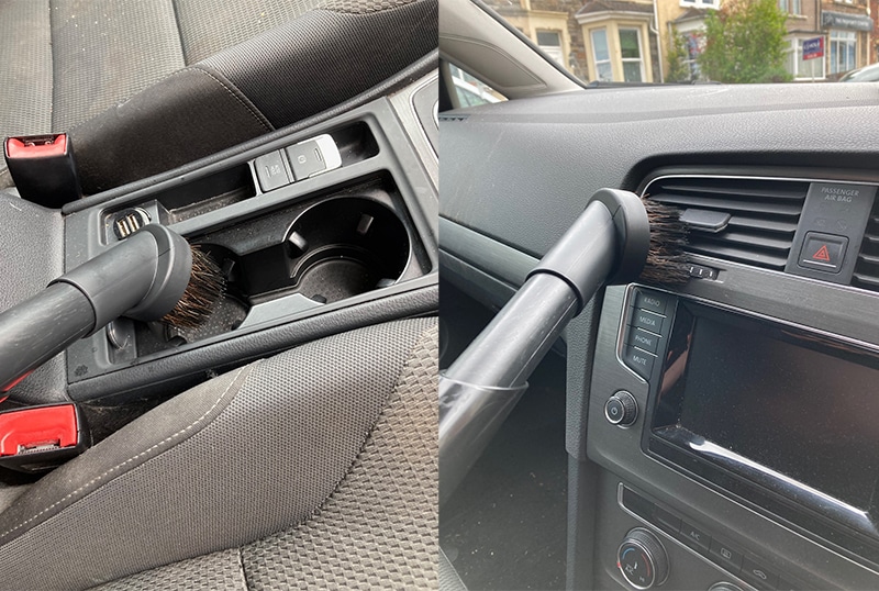 Henry XL Plus' soft dusting brush being used to clean car seats and dashboard