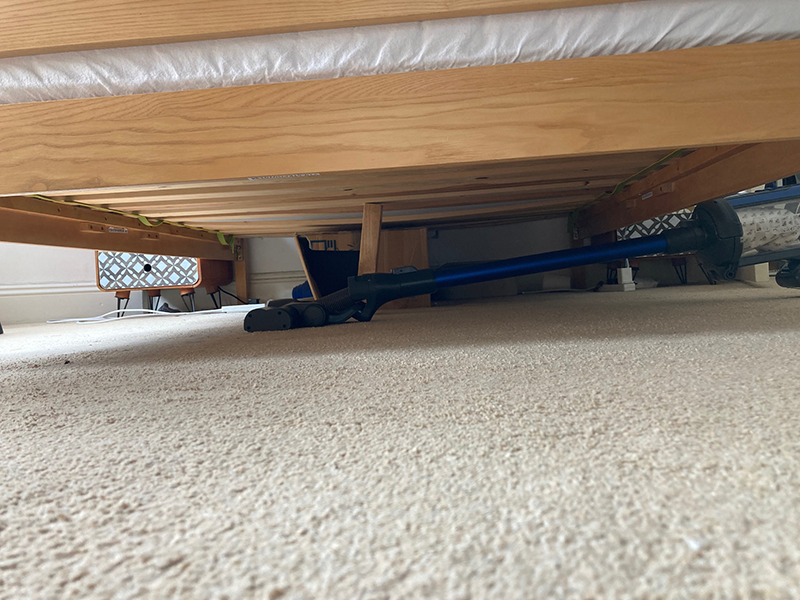 Henry Quick Pet reach underneath a bed